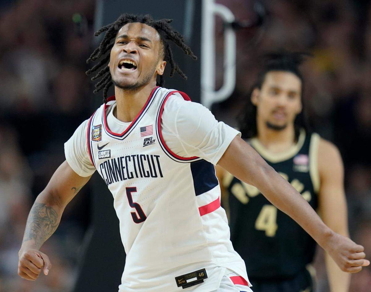 Connecticut Huskies guard Stephon Castle (5) celebrates after a foul call during the NCAA Men's Basketball Tournament Championship against the Purdue Boilermakers, Monday, April 8, 2024, at State Farm Stadium in Glendale, Ariz.