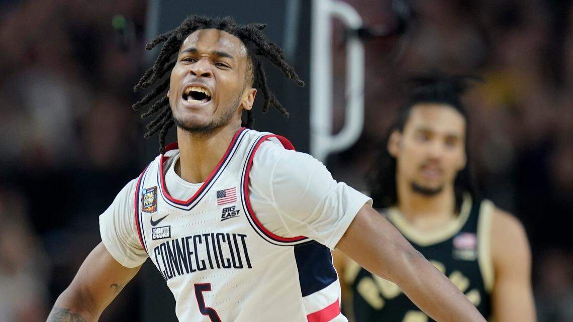 Connecticut Huskies guard Stephon Castle (5) celebrates after a foul call during the NCAA Men's Basketball Tournament Championship against the Purdue Boilermakers, Monday, April 8, 2024, at State Farm Stadium in Glendale, Ariz.
