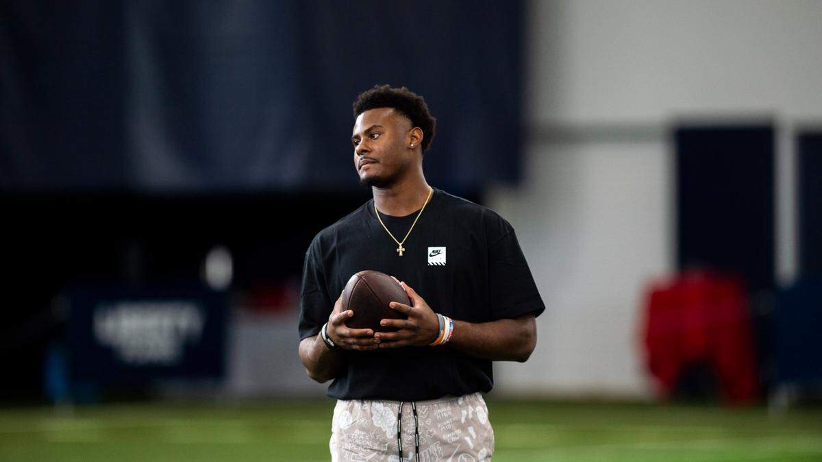Liberty quarterback Malik Willis warms up before his pro day in March.