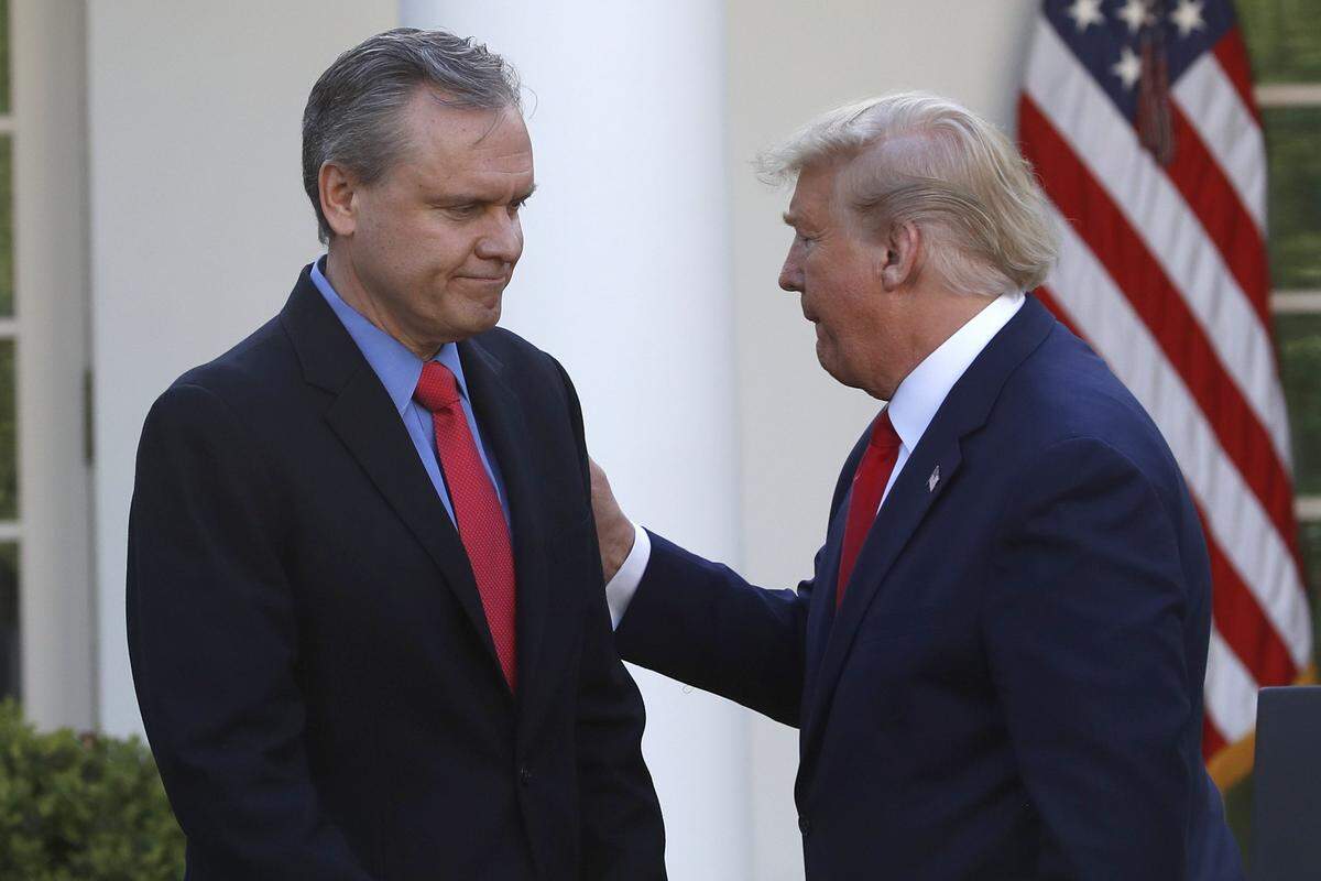 Darius Adamczyk, CEO of Honeywell, with President Donald Trump as he goes to speak during a briefing about the coronavirus at the White House, Monday, March 30, 2020. Charlotte-based Honeywell expanded production in Rhode Island and Arizona facilities that will allow it to make over 20 million N95 masks per month.