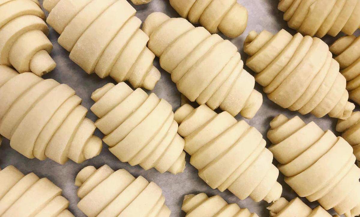 At Copain, you can find traditional and petite butter croissants, along with a twice-baked ham and cheese combination.