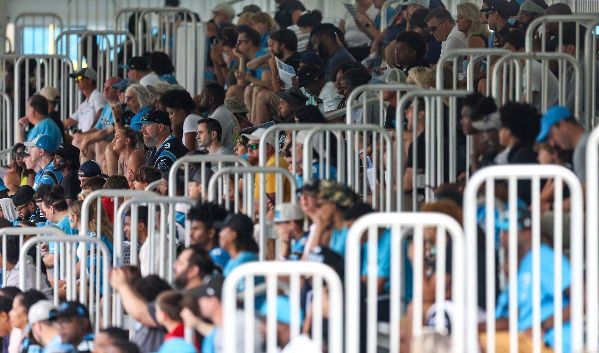 Fans watch the Panthers during the team’s first training camp practice on Wednesday.
