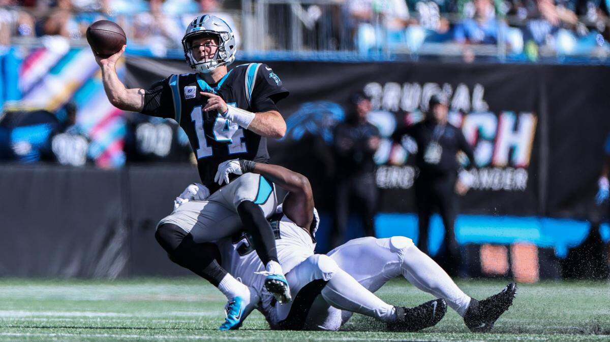 Carolina Panthers quarterback Sam Darnold has been under duress in the team’s last two games, throwing three interceptions while getting sacked eight times.
