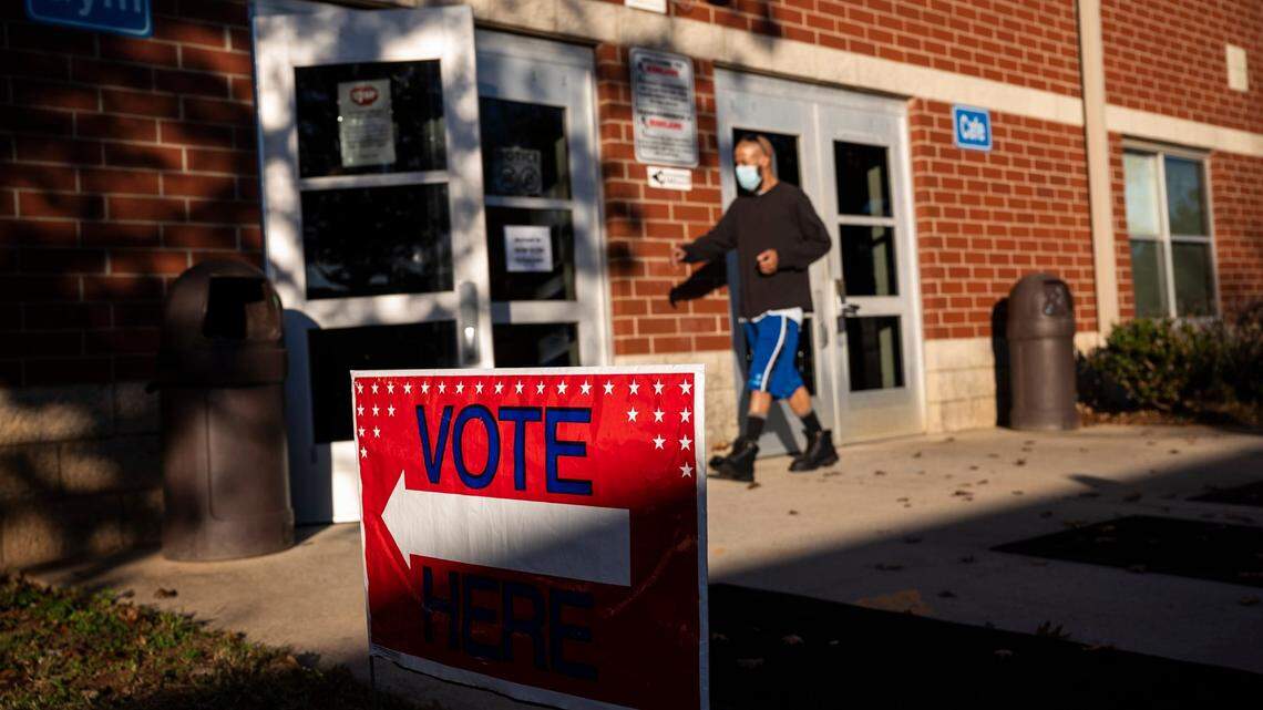 A voter enters the polling location at Highland Renaissance Academy for mid-term elections on Tuesday, November 8, 2022.