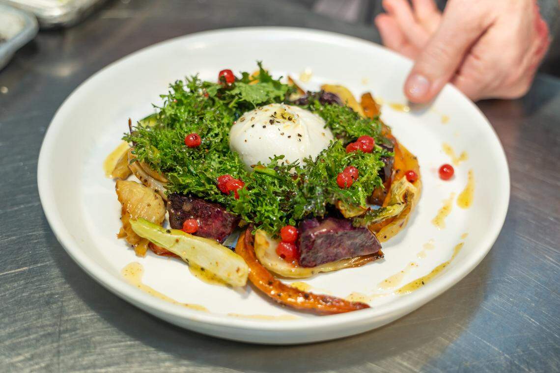 Salads are a brightly colored celebration at Restaurant Constance, including the burrata and mizuna salad shown above.