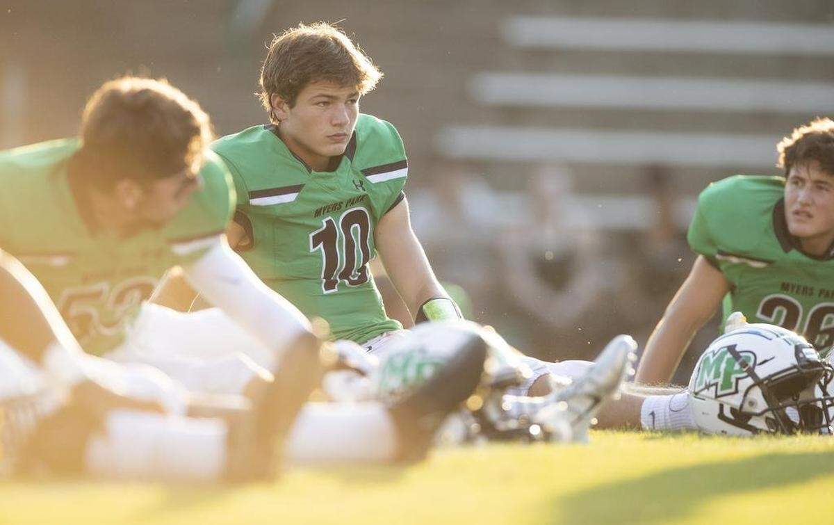 Myers Park quarterback Drake Maye warms up before a playoff game.