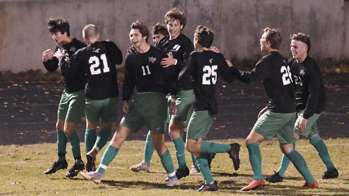 Members of Myers Park High soccer team celebrate a goal against Independence High during their third round NCHSAA boys soccer playoff game n Thursday, November 8, 2018.
