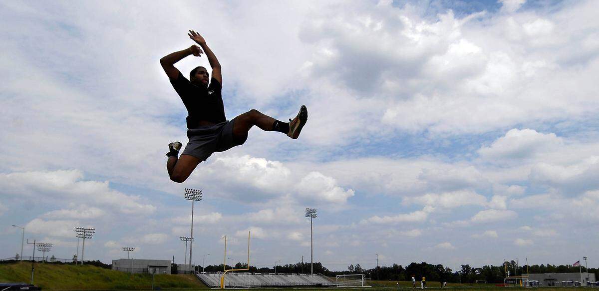 David T. Foster III's 2008 photo of Austin Lewis, who at the time was a junior at Mallard Creek High School and the best long jumper in North Carolina.