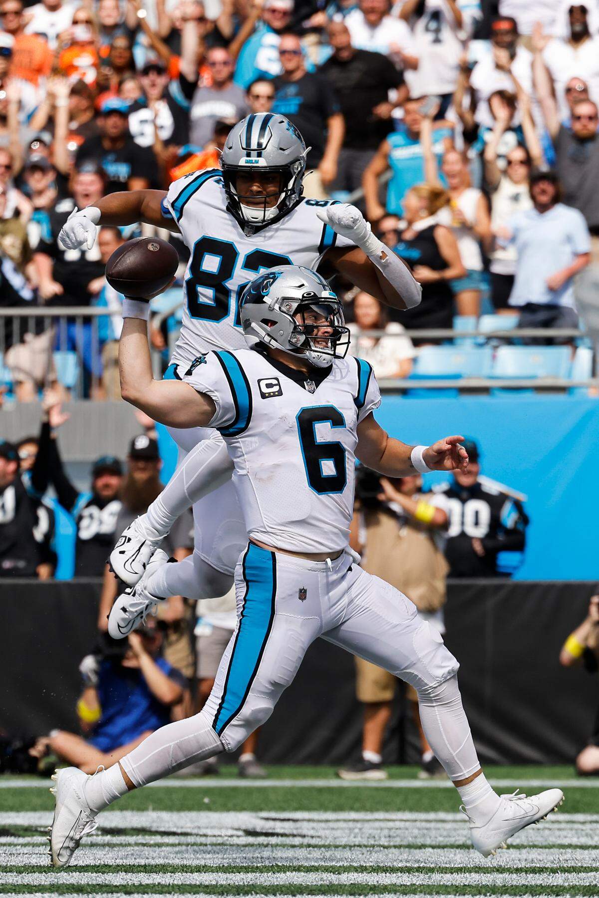 Carolina Panthers quarterback Baker Mayfield (6) celebrates a touchdown with Carolina Panthers tight end Tommy Tremble (82) during a game against the Cleveland Browns at Bank of America Stadium in Charlotte, N.C., Sunday, Sept. 11, 2022.