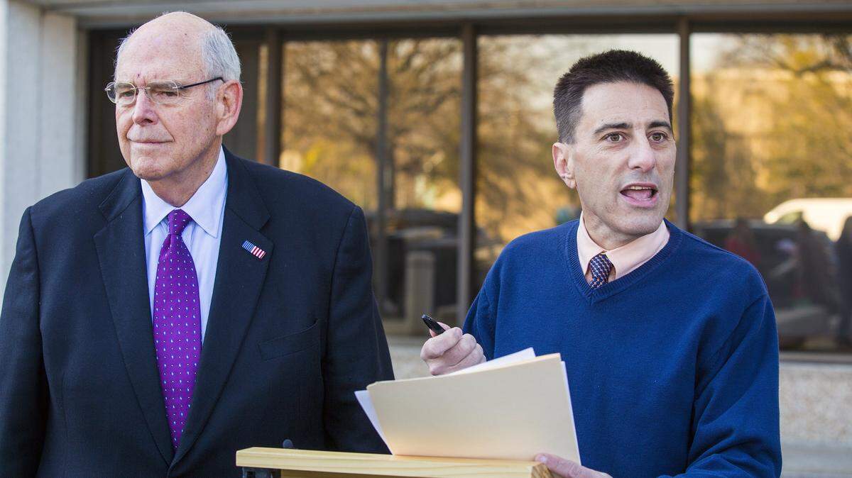 Dallas Woodhouse, right, (shown with NC GOP chairman Robin Hayes) calls one of Brett Kavanaugh’s accusers a “criminal” who belongs in prison.