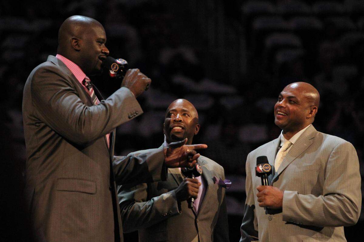 February 24, 2012; Orlando FL, USA; TNT anchor Kenny Smith introduces Team Shaq general manager Shaquille O’Neal and Team Chuck general manager Charles Barkley before the BBVA rising stars challenge at the Amway Center in Orlando. Mandatory Credit: Kim Klement-USA TODAY Sports