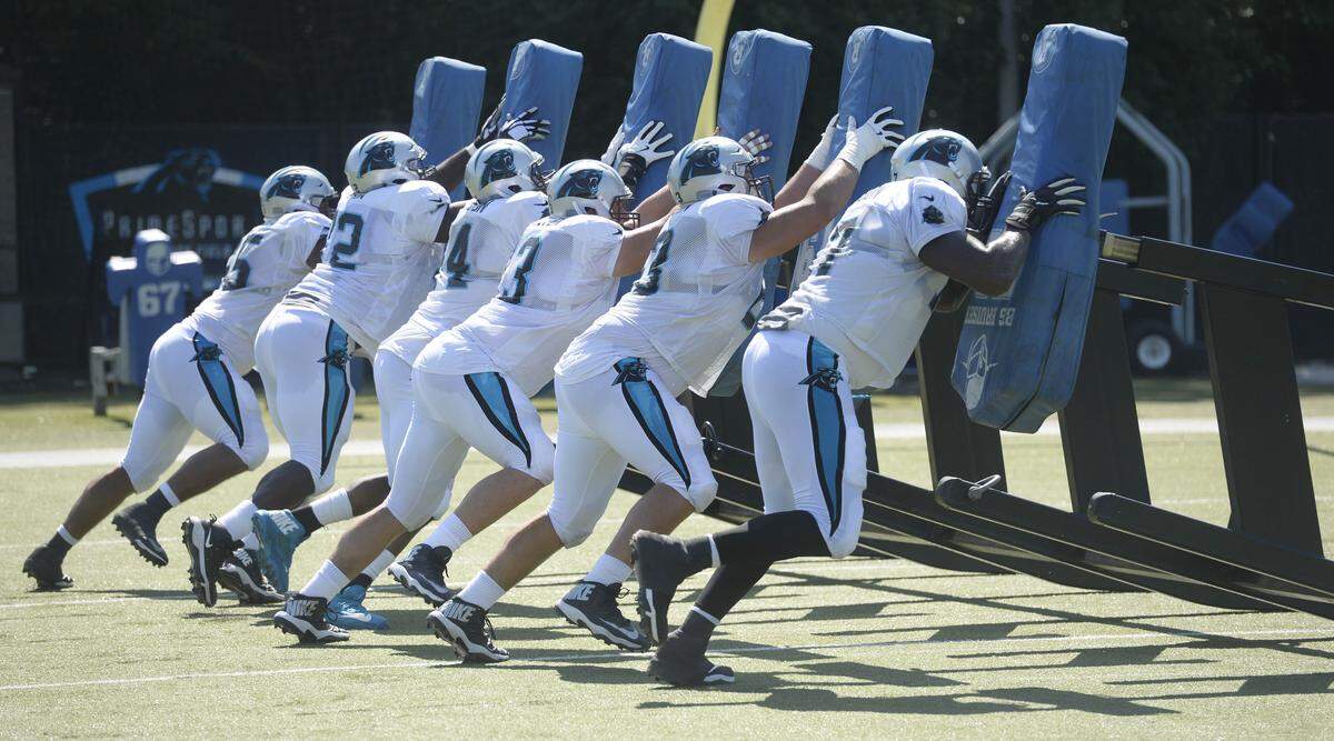 Members of the Carolina Panthers offensive line run a drill at practice on Wednesday, September 19, 2018.