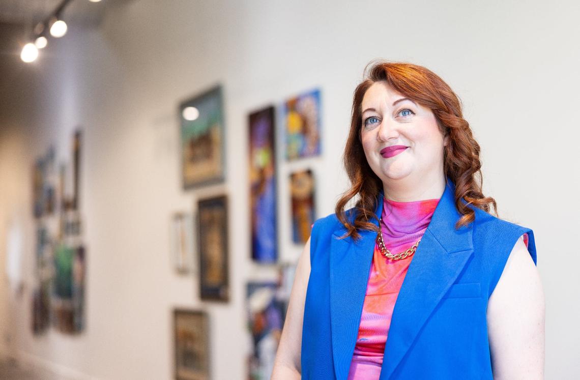 Charlotte Art League’s new executive director, Kate McAllister, shown Wednesday in the gallery, is taking steps to “right size” the nonprofit after months of financial and leadership problems.