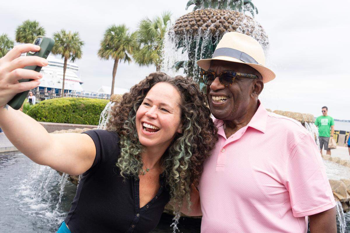 Chef Stephanie Izard poses with TV personality Al Roker at the FOOD & WINE Classic in Charlteson. Izard presented Outside the Brunch Box: Diner Favorites with a Twist; and Roker presented Recipes to Live By: Memory-Making Family Dishes