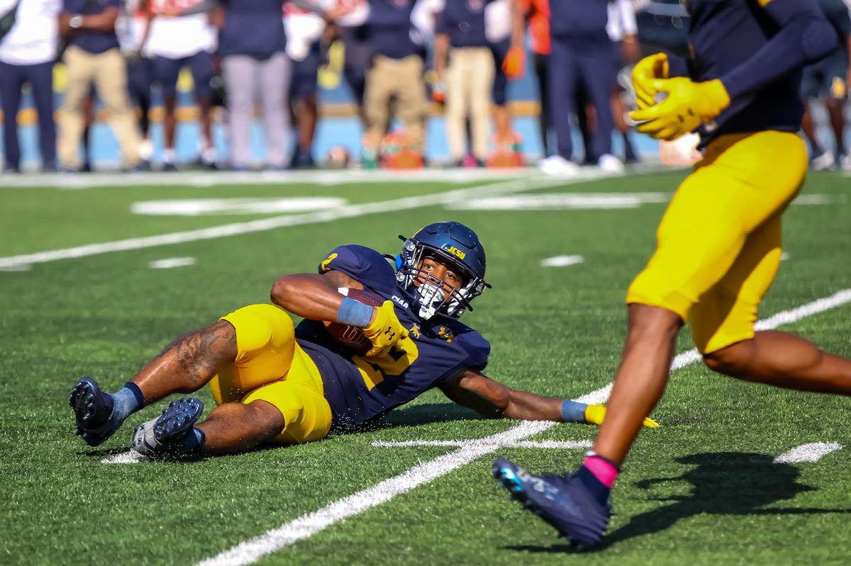 JCSU Quarterback Darius Ocean slides to safety after running the kickoff down as the clock counts down the final seconds during the game against Virginia State at Johnson C Smith University in Charlotte, NC on Saturday, October 5th, 2024