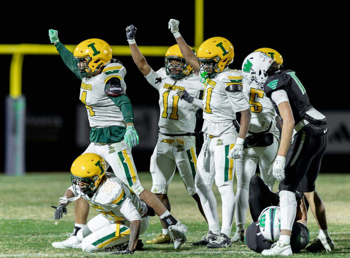 Indepedence defense celebrate a third and short play for the Weddington Warriors. Weddington would host Independence in the NCHSAA quarterfinal playoff game Friday, November, 28 2025.