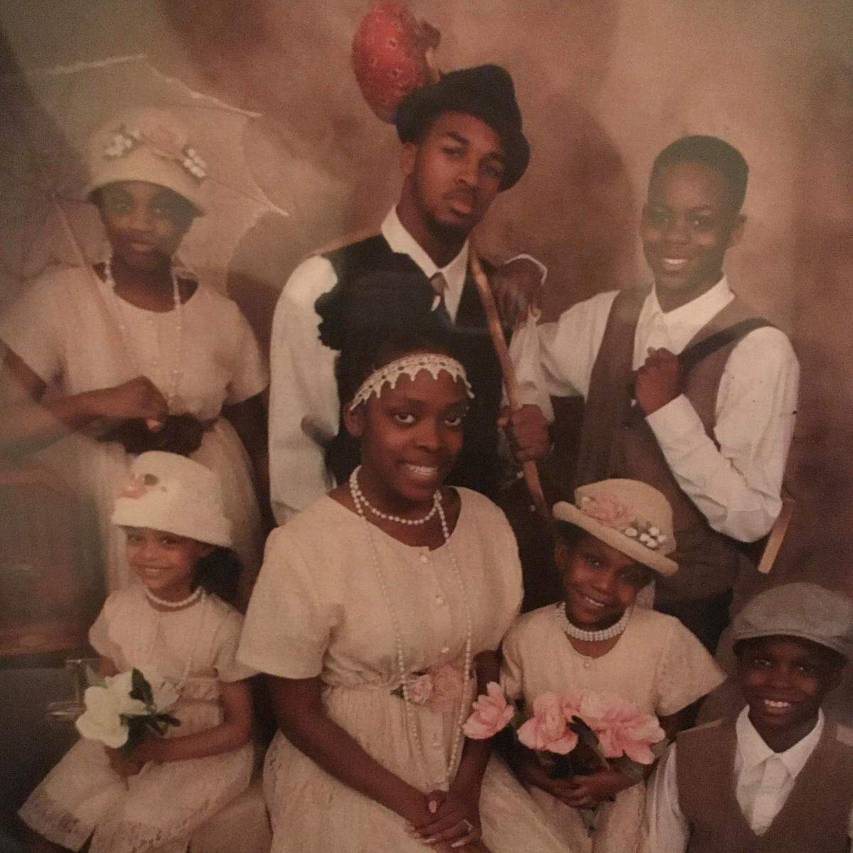 Tuwand Fluker-Grier had this old-time photo taken of her children and her brother’s children about a month after her brother passed away of sickle cell anemia in 2017. She decided to take the photo on the spur of the moment while shopping at Wal-Mart one day to raise the family’s spirits.