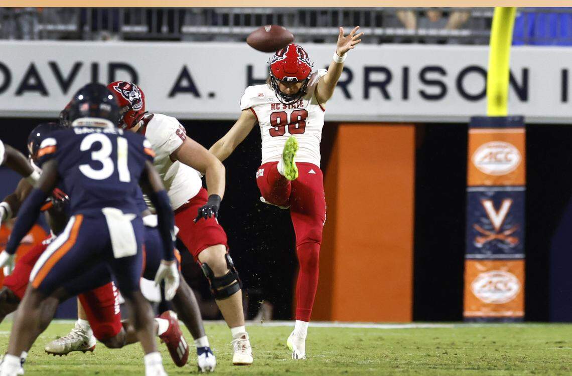 N.C. State’s Caden Noonkester (98) punts during the second half of N.C. State’s 24-21 victory over Virginia at Scott Stadium in Charlottesville, Va., Friday, Sept. 22, 2023.