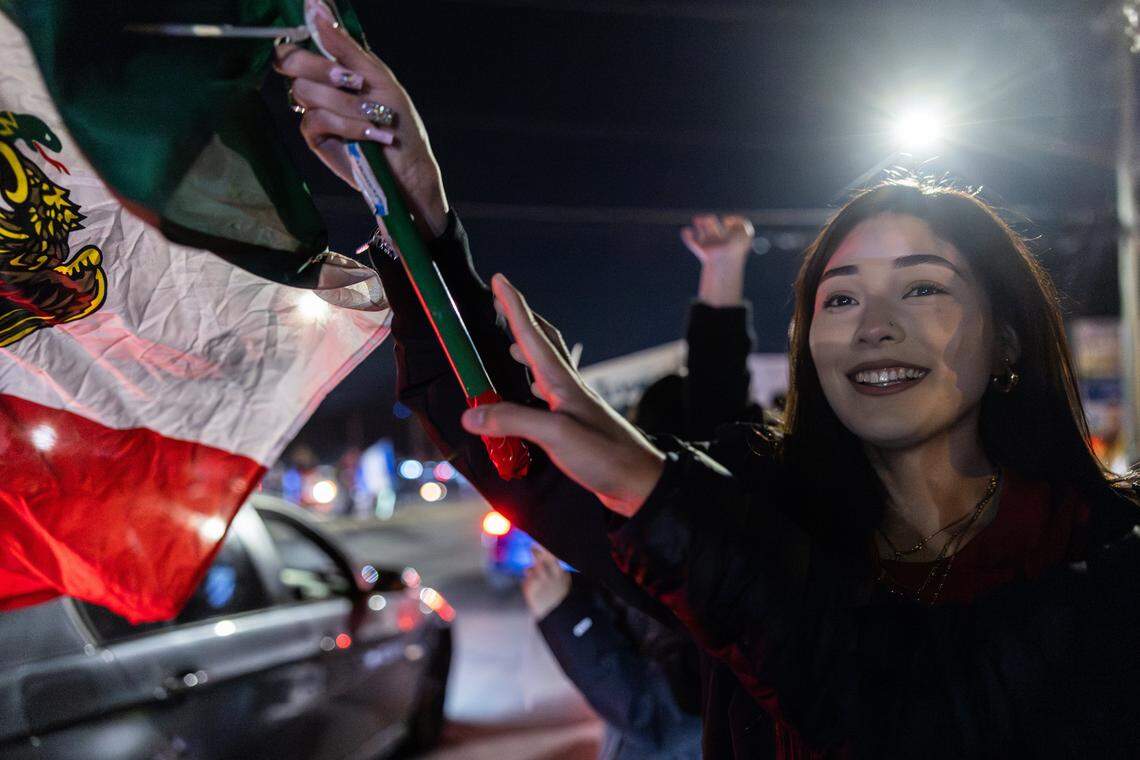 Protesters gather outside of Manolo’s Bakery to protest ICE and Border Patrol in Charlotte, N.C., on Wednesday, November 20, 2025.