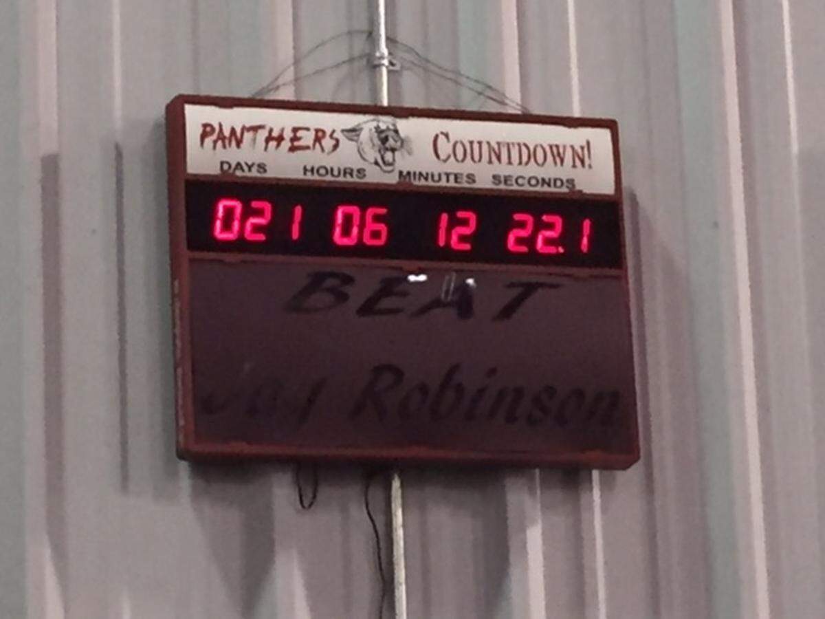 A scoreboard counts down to Lenoir Hibriten’s high school football season opener. The town is excited to see the team, which was unbeaten and a state champion in 2017
