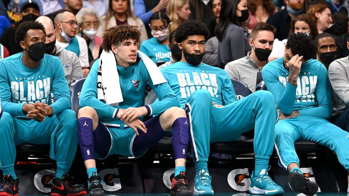 (Left-Right) Charlotte Hornets guards Ish Smith, LaMelo Ball, center Nick Richards and guard James Bouknight sit on the teamÕs bench as the Miami Heat extend their lead during second half action at Spectrum Center on Saturday, February 5, 2022 in Charlotte, NC. The Heat defeated the Hornets 104-86.