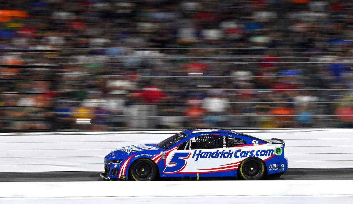 NASCAR driver Kyle Larson blurs past the front stretch of North Wilkesboro Speedway during the NASCAR All-Star race on Sunday, May 21, 2023. Larson would go on to win the race.