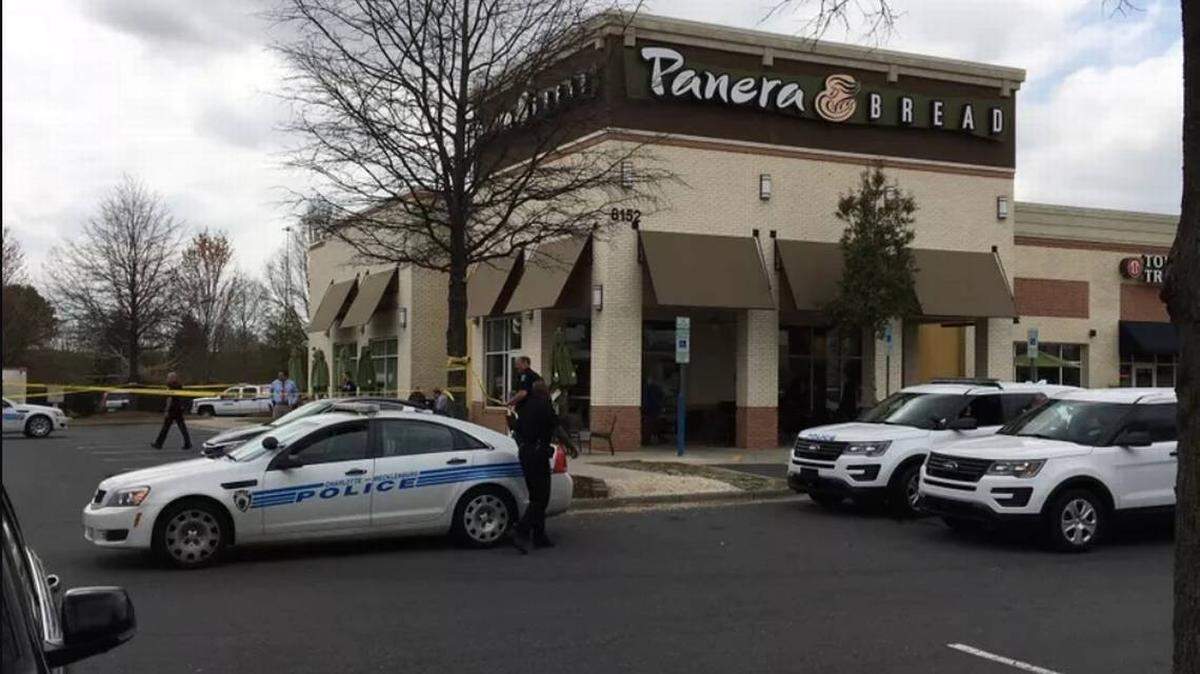 Charlotte-Mecklenburg Police have a suspect in the killing of a man found in a Panera Bread parking lot on South Tryon Street.