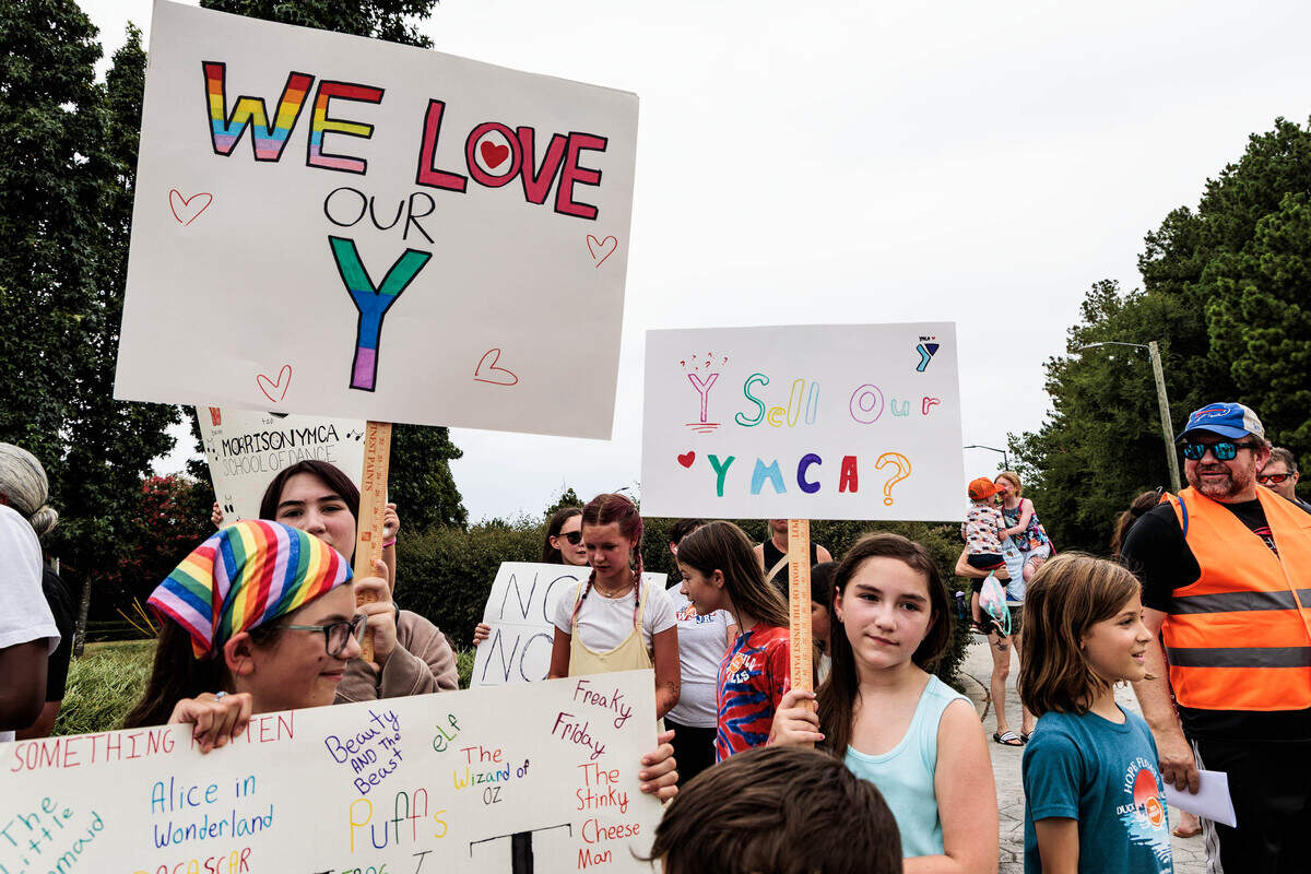 Children protest the sale of the Morrison Family YMCA campus in Ballantyne to Moments of Hope Church on Sunday, July 12, 2026. The Y has a children’s center and programming.