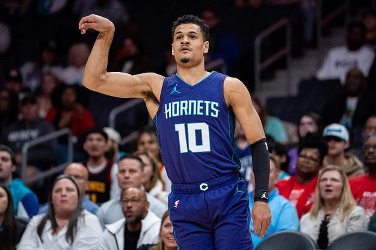 Josh Green of the Charlotte Hornets watches his shot in the first half against the Atlanta Hawks during their game at Spectrum Center.