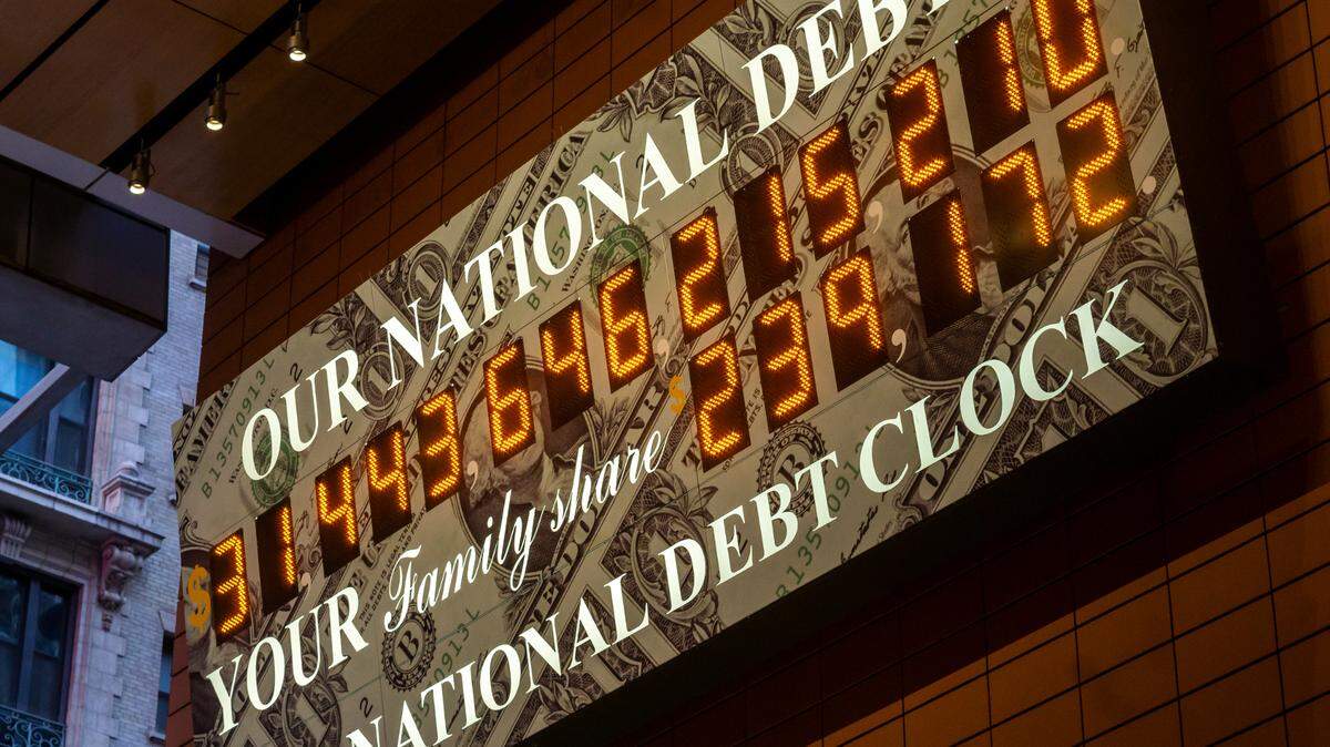 The National Debt Clock in the Times Square area in New York City on Tuesday, May 17, 2023.