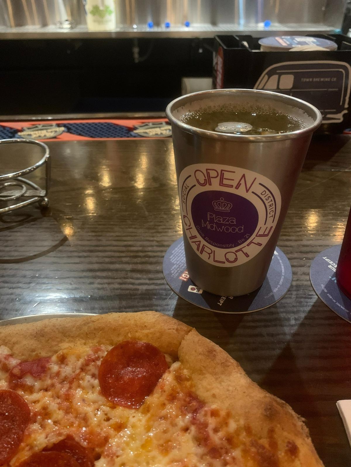 People age 21 and older can now purchase special cups from certain Plaza Midwood businesses, which can be carried around the neighborhood as part of Charlotte’s first social district.