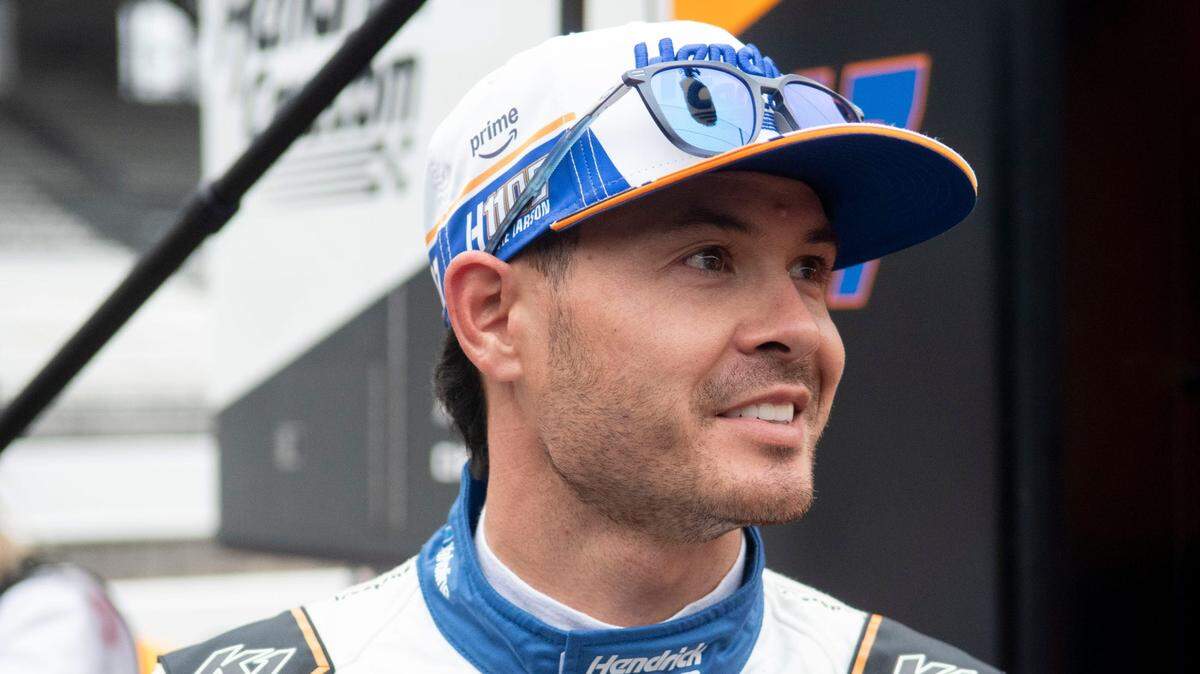 Arrow McLaren driver Kyle Larson (17) smiles by his pit box Friday, May 16, 2025, during Fast Friday ahead of the 109th running of the Indianapolis 500 at Indianapolis Motor Speedway.