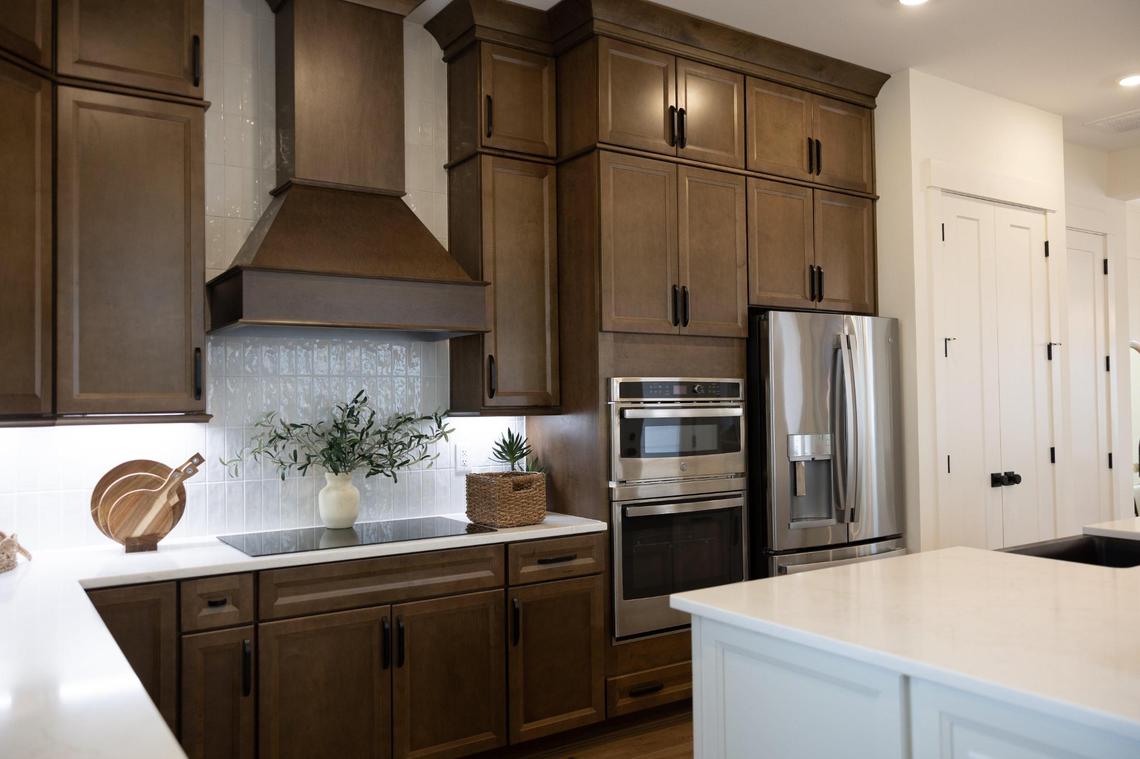 A look a kitchen inside a model home at Lakeside Pointe in Sherrills Ford, N.C., on Friday, March 7, 2025. Lakeside Pointe is a new custom-home waterfront community overlooking the lake in Sherrills Ford. The property includes 83 waterfront acres.