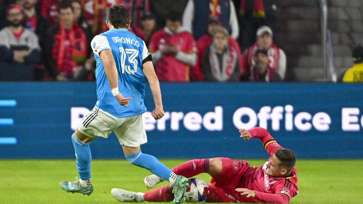 Mar 4, 2023; St. Louis, Missouri, USA; St. Louis City SC defender Jake Nerwinski (2) defends against Charlotte FC midfielder Brandt Bronico (13) during the second half at CITYPARK. Mandatory Credit: Jeff Curry-USA TODAY Sports