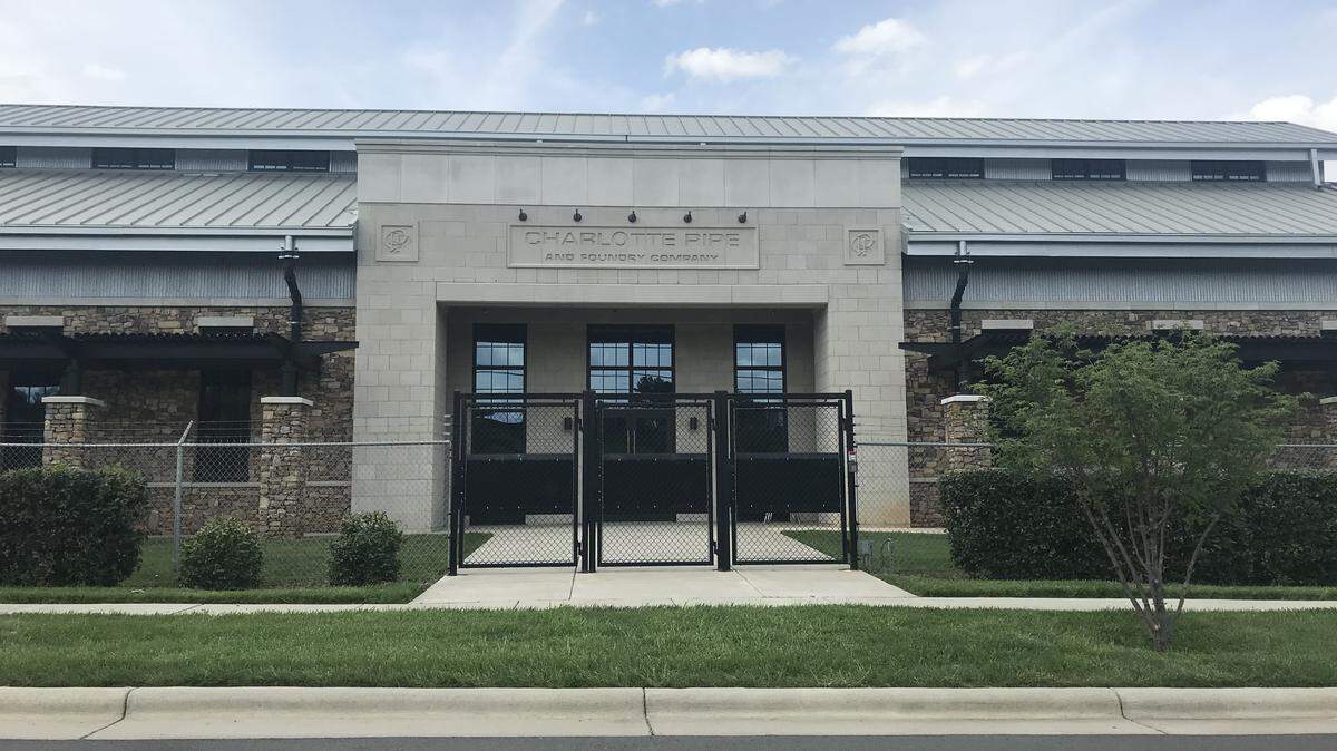 Charlotte Pipe and Foundry, which melts scrap metal into pipe, occupies about 55 acres a few blocks from Bank of America Stadium on South Clarkson Street.