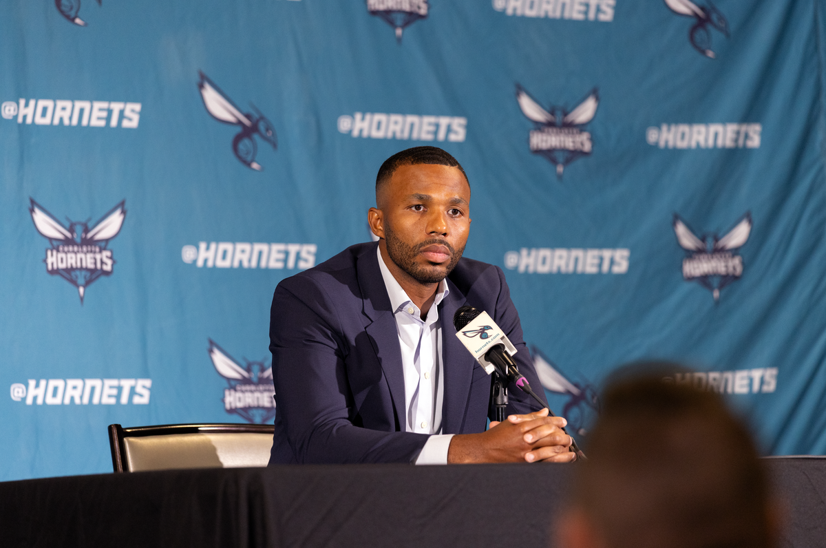 Charlotte Hornets president of basketball operations Jeff Peterson addresses reporters during media day before the 2025-26 season at Queens University’s Levine Center.