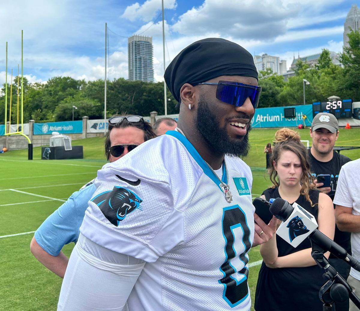 Brian Burns has switched to the number “0” for the 2023 NFL season, becoming the first Carolina Panther to wear the number. Of the amount of money he had to pay to buy up the remaining No. 53 jerseys in stock, Burns replied in this June 14, 2023 press conference in Charlotte: “That’s classified.”
