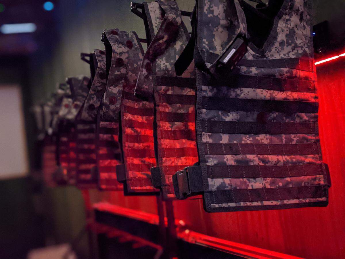 When the arena doors open, Bordertown players at District 57 entertainment complex in Charlotte are transported into the frontlines of a high-speed combat zone as they suit up in bulletproof vests and grab their military-inspired black ops rifles.