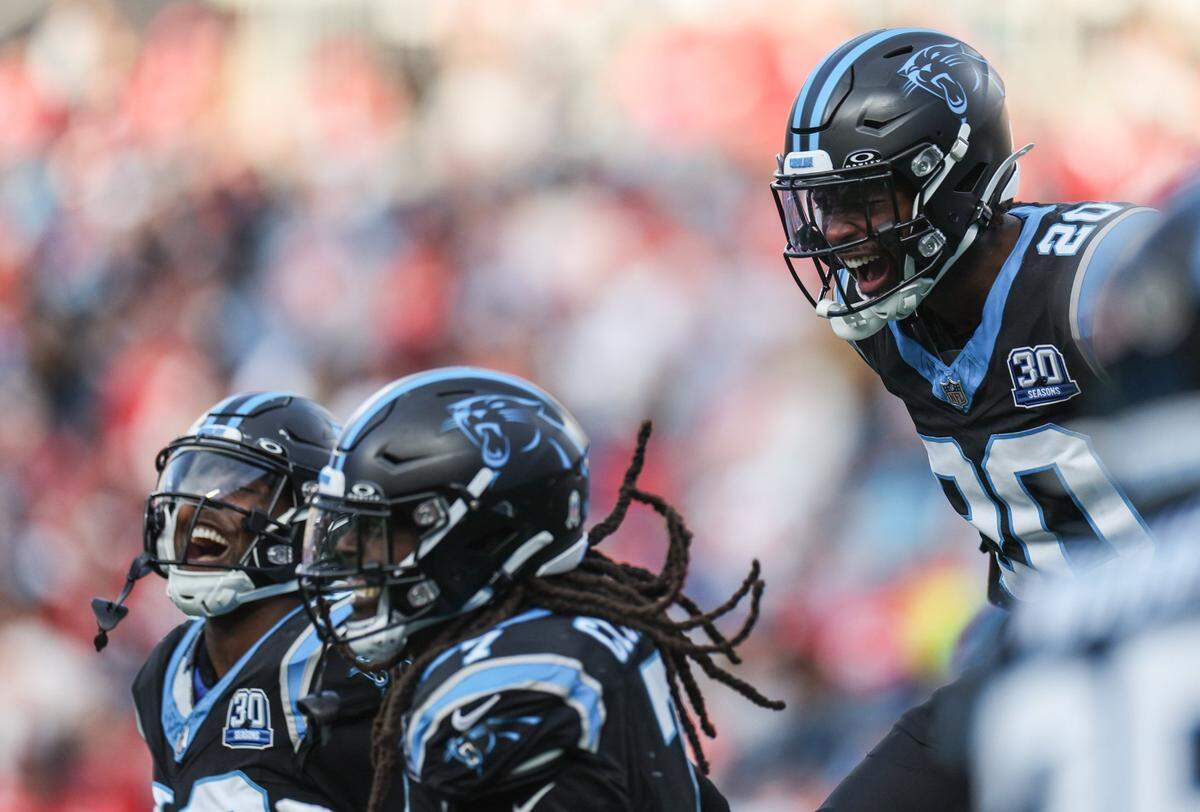 Panthers safety Jordan Fuller, far right, celebrates with teammates after a quarterback sack during the game against the Chiefs at Bank of America Stadium in Charlotte, NC on Sunday, November 24, 2024.