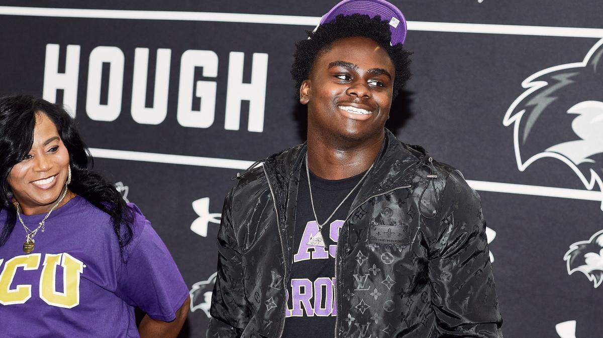 Hough High's LJ Porter, a top high school football recruit in North Carolina, announces his college decision to Eastern Carolina at Hough High School in Cornelius, NC.