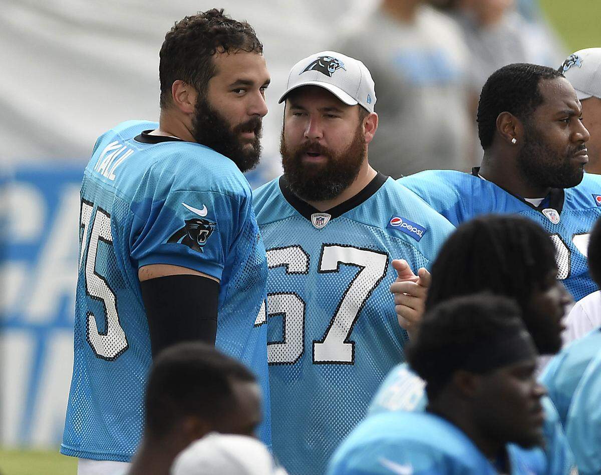 Carolina Panthers center Ryan Kalil (67) has made it a point to share his knowledge and wisdom with younger players, as Jordan Gross and others did for him when he was breaking into the league. That includes Monday, when he had a talk with with teammate and brother Matt Kalil (75) during training camp at Wofford College in Spartanburg.