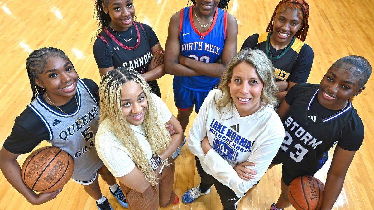 All-Observer girls basketball team front row (L-R) Za’Miya Bynum, coach Kendra Holmes, coach McKenzie Graham and Oshauna Holland. Back row (L-R) Madison Drayton, Lenise Joseph and Tionna Pettus.