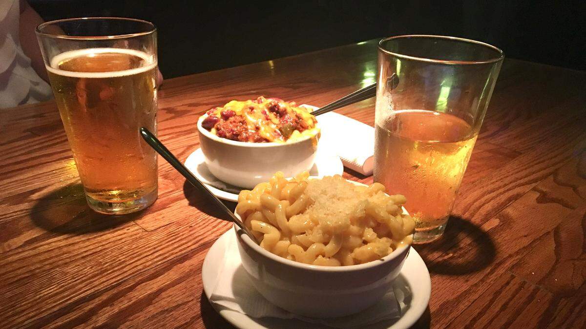 Charlotte restaurants are open for late night dinners, snacks and more. Shown here is Jack Mac from JackBeagles, paired with local beers.