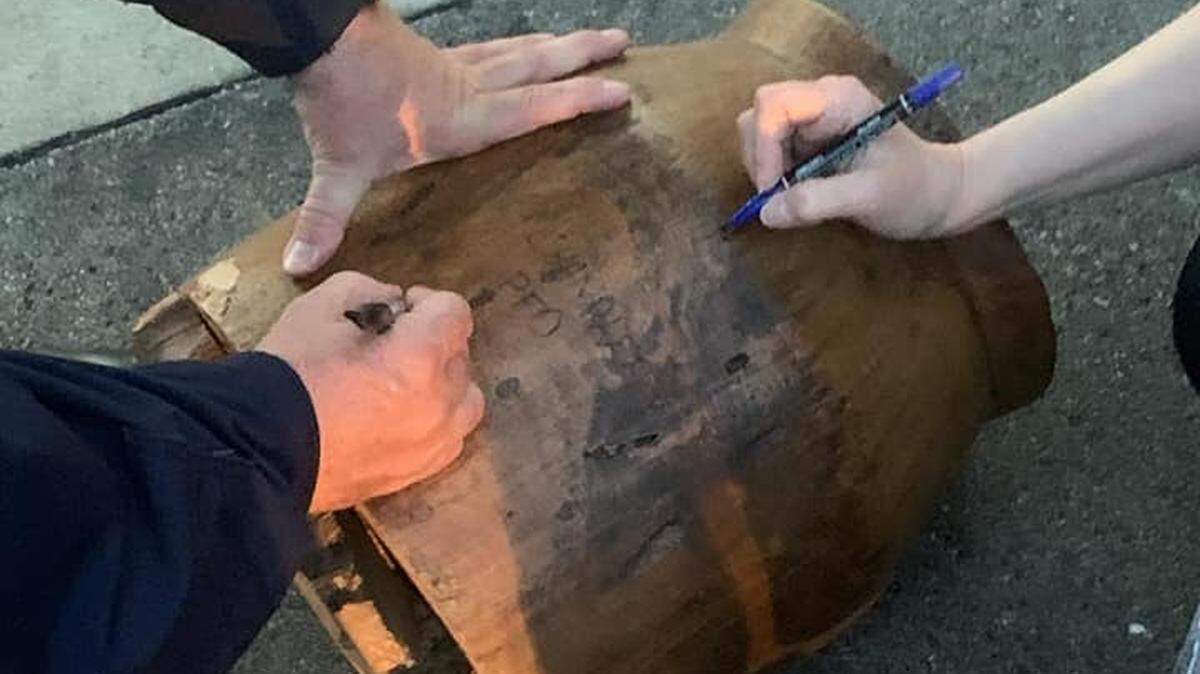 Tennessee firefighters rescued a child who got stuck in a wooden barrel over the weekend. They signed the barrel for the child’s parents.