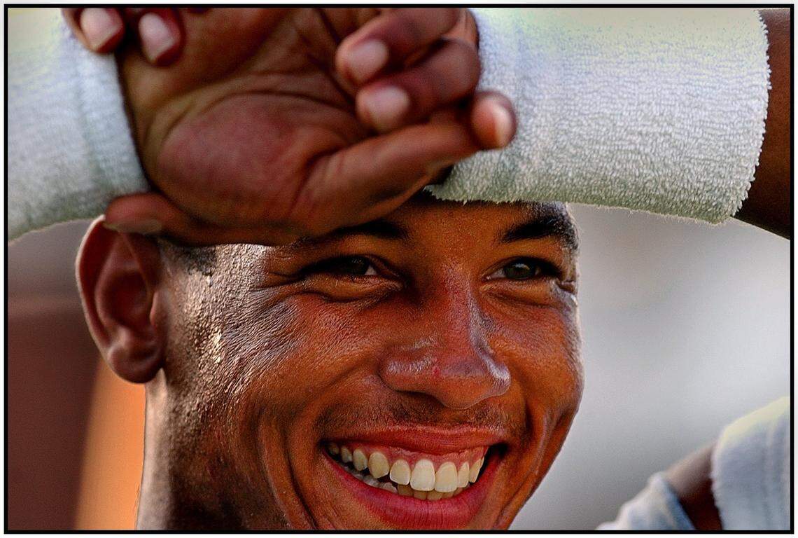 Independence Quarterback Chris Leak was all smiles as he went through drills with teammate prior to their game against North Meck High School.PATRICK SCHNEIDER/STAFF