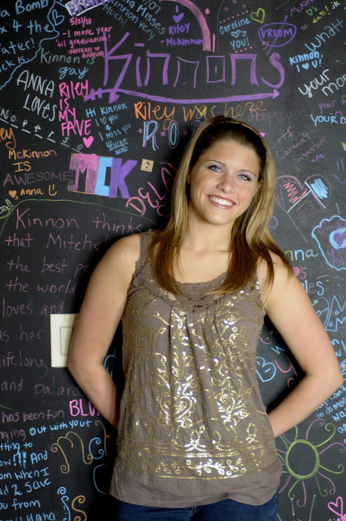 McKinnon Galloway, photographed by The Charlotte Observer just a short time before her graduation from Hopewell High School in 2011. At the time, she still had her hearing in both ears.