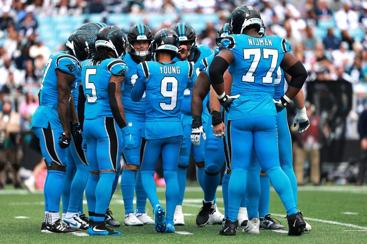 Carolina Panthers quarterback Bryce Young talks to the team during a huddle in the game against the Dallas Cowboys at Bank of America Stadium on October 12, 2025 in Charlotte, North Carolina. (Photo by Grant Halverson/Getty Images)