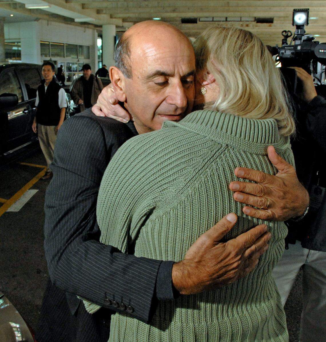 Carl Bazarian of Amelia Island hugs wife Linda after seeing her for the first time upon returning to Jacksonville from the Jan. 15, 2009, "Miracle on the Hudson" in Manhattan, N.Y. 