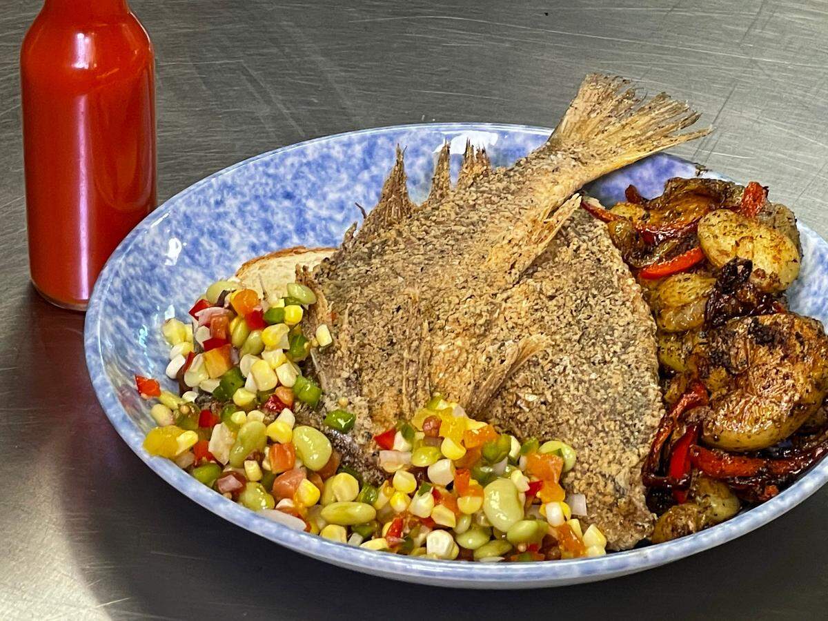 Fried croaker and potatoes by chefs Oscar Johnson and DC Cooper of Jimmy Pearl’s in Charlotte, N.C.