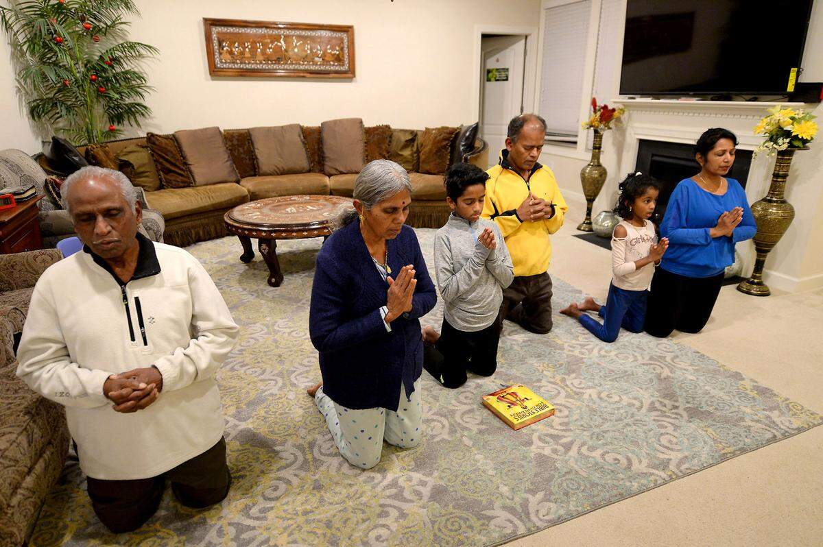 The Gaspar family is one of millions of multigenerational households in the United States. Nidiya Gaspar, far right, and husband Lawrence, second from right, helped her parents Nirmala Michael, second from left and Lourdu Susai, left, immigrate to the United States.